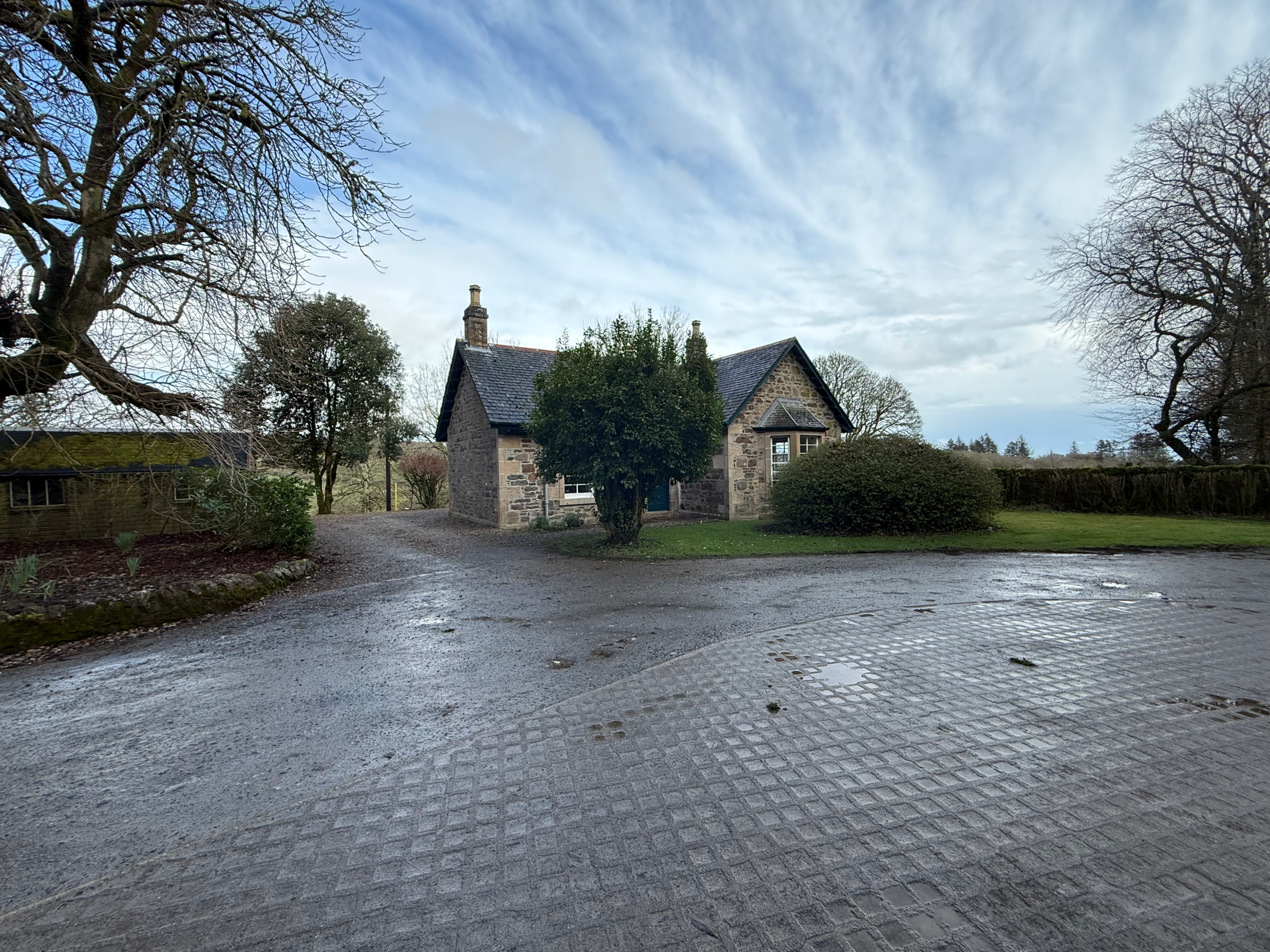Saddell Lodge is a handsome granite gate lodge, guarding the entrance to stunning Saddell Bay on the east coast of Kintyre looking out across the Kilbrannan Sound to the Isle of Arran.
